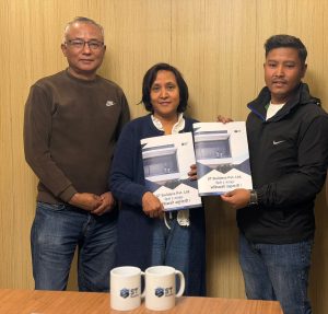 Er. Milan Nepali of ST Builders with homeowners during construction contract signing for a house construction project in Nepal.